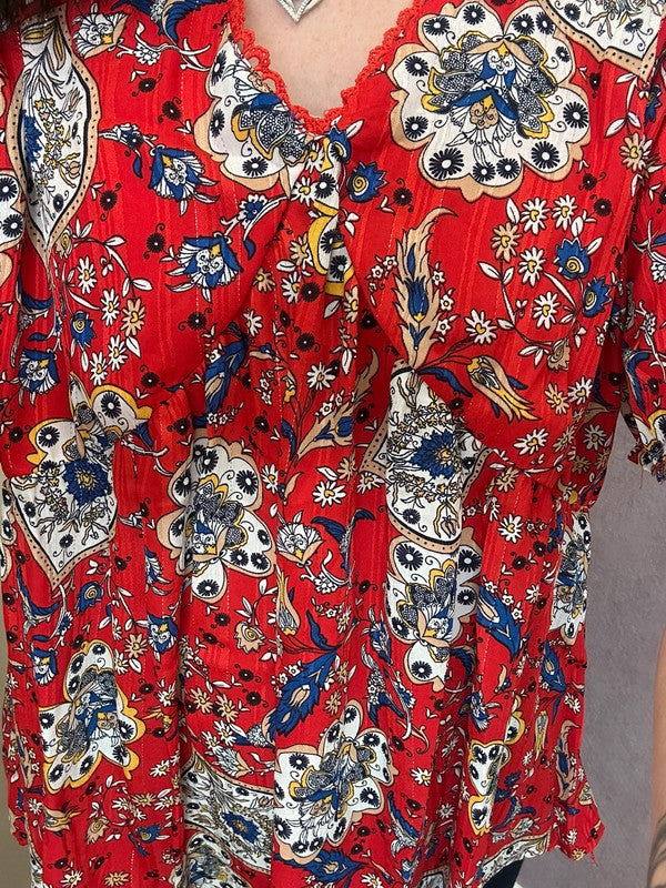 Top imprimé fleuri rouge doré