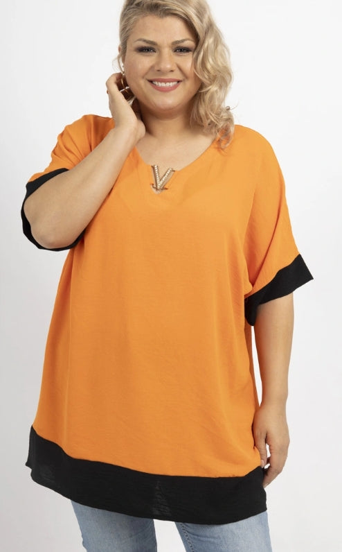 Blouse bicolore manches chauve-souris à col en V