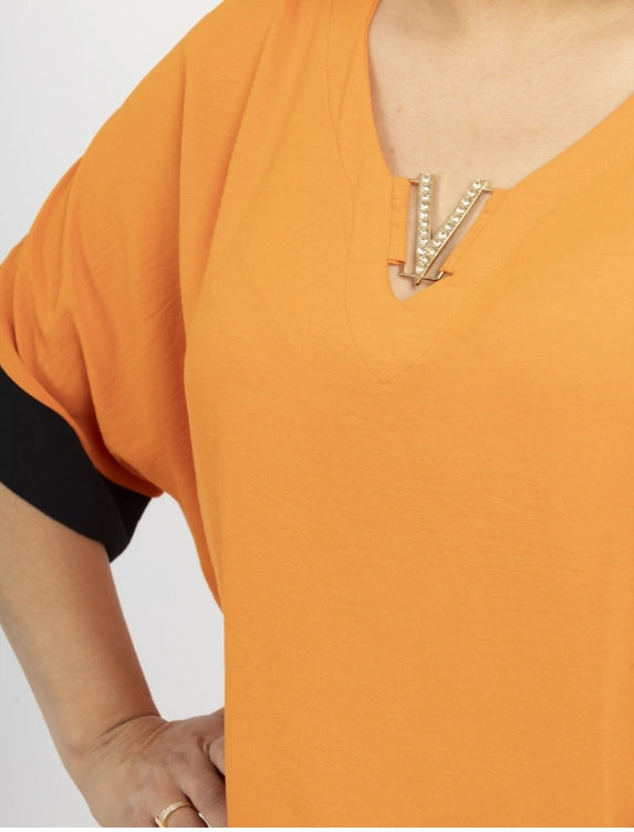 Blouse bicolore manches chauve-souris à col en V