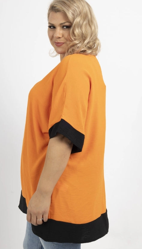 Blouse bicolore manches chauve-souris à col en V