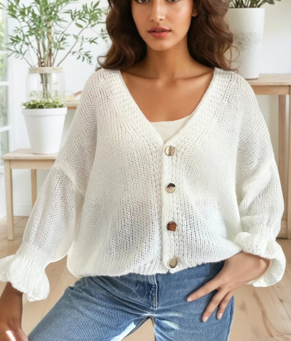 Cardigan en maille duveteux, avec poches, bouton dorée.