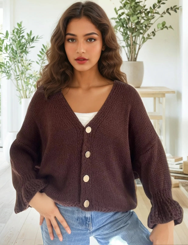 Cardigan en maille duveteux, avec poches, bouton dorée.